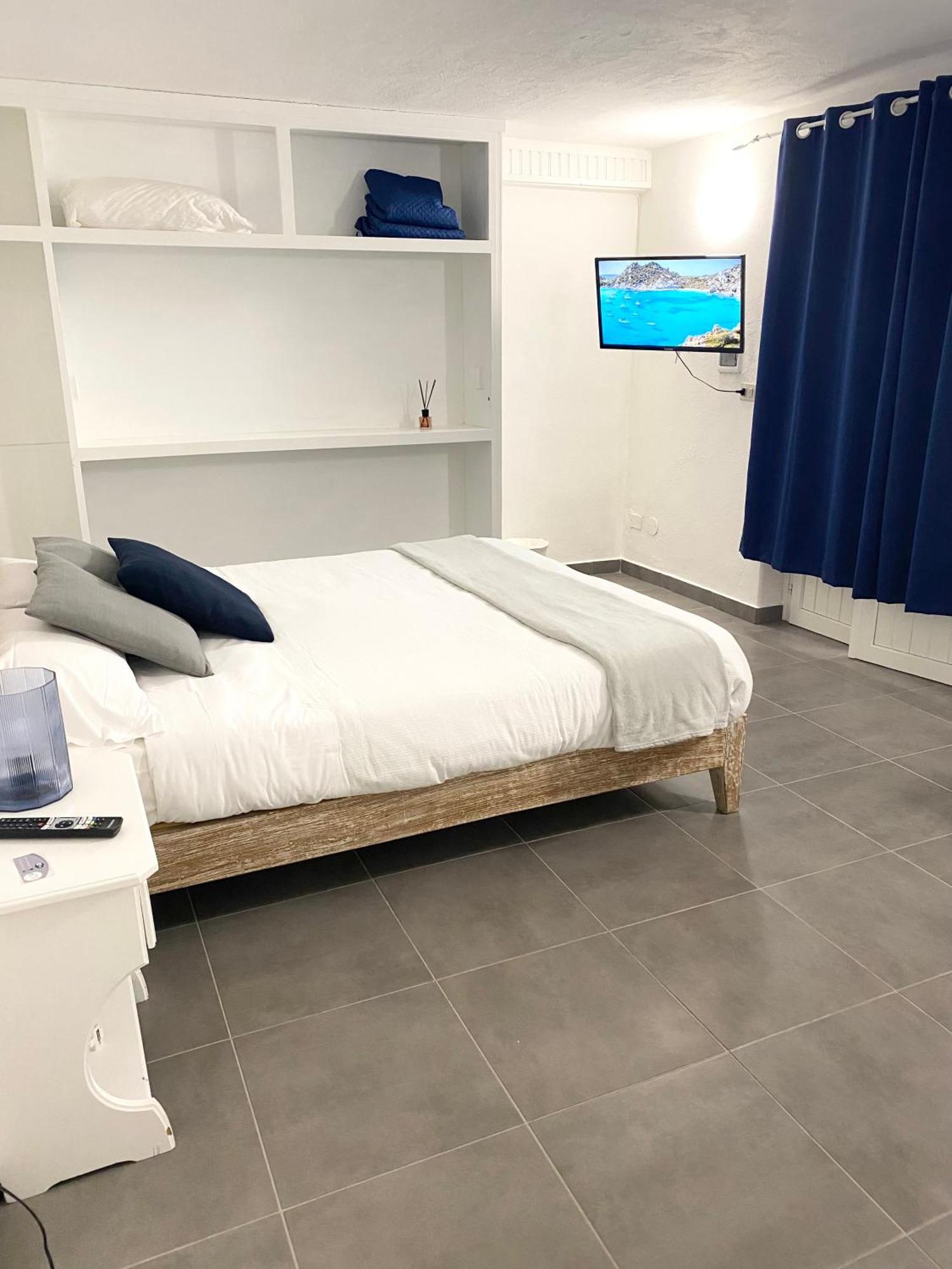 Cala Reale Rooms Marinella Марінелла Екстер'єр фото