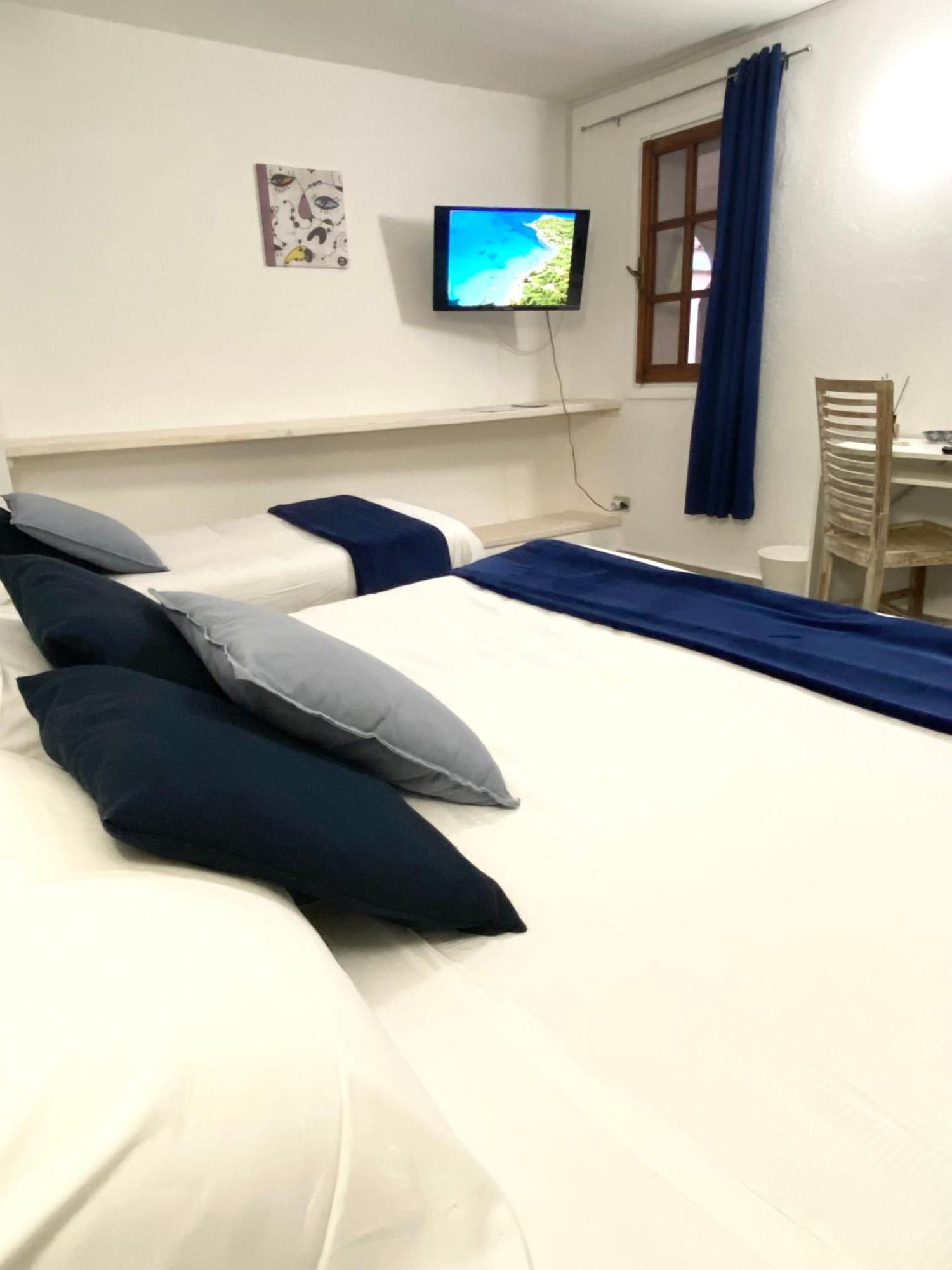 Cala Reale Rooms Marinella Марінелла Екстер'єр фото