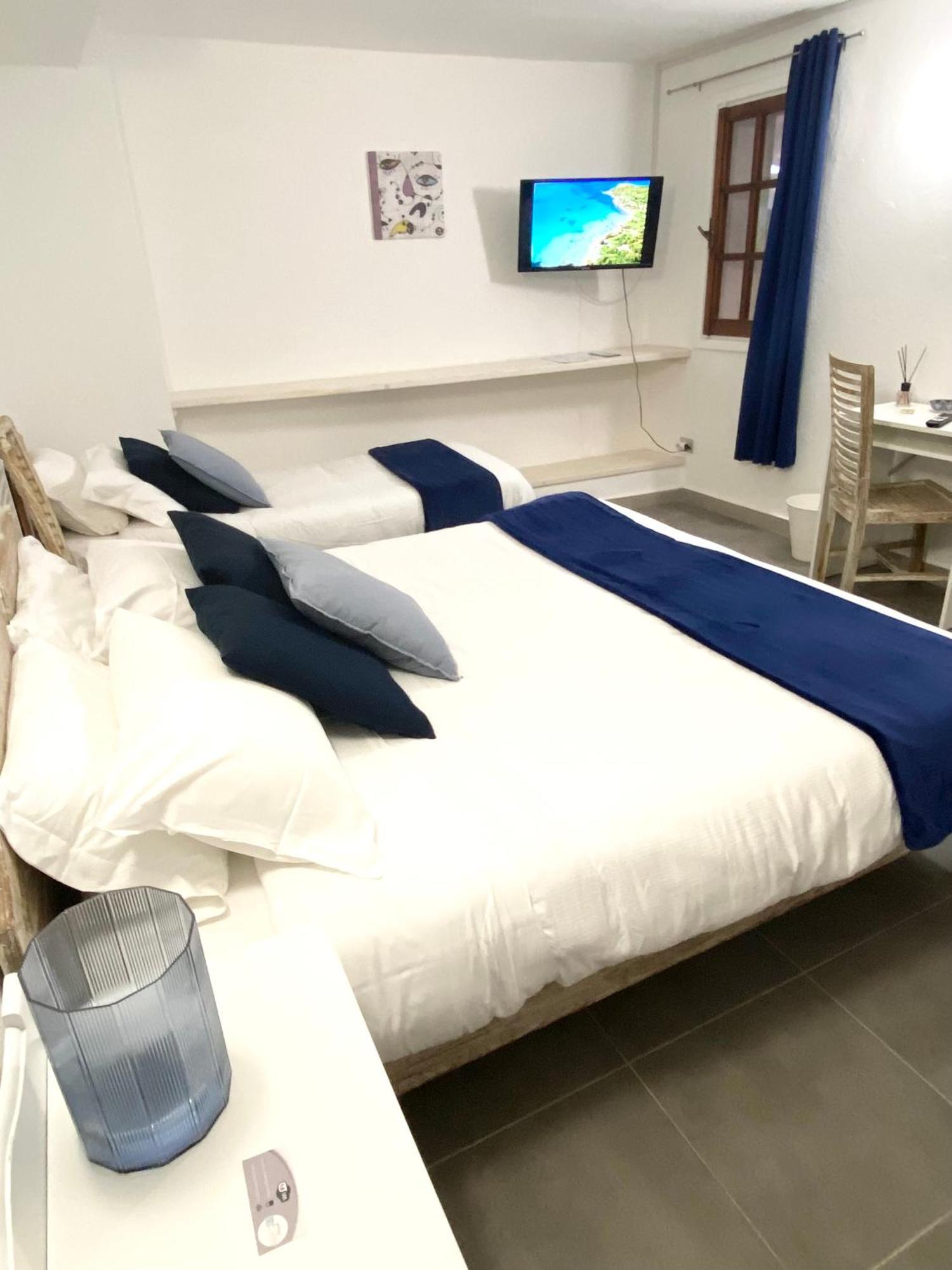 Cala Reale Rooms Marinella Марінелла Екстер'єр фото